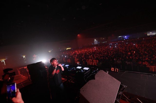 DJ Performs Live at Packed Wobbleland Festival Arena