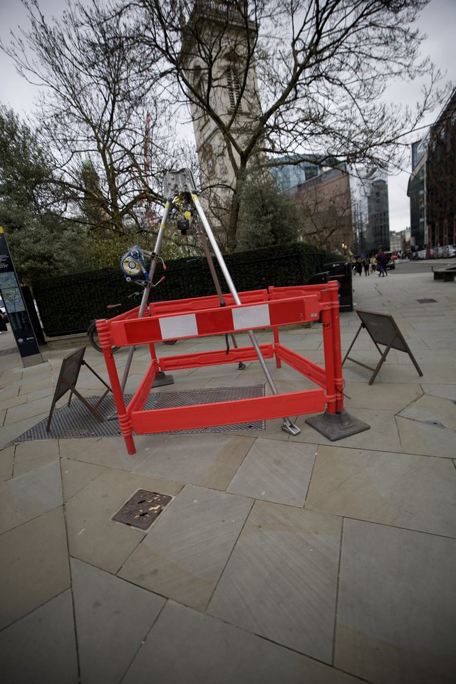 Construction Barrier on London Pavement with Tower