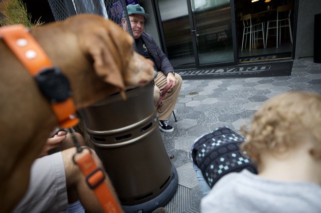 Urban Gathering Around Public Bench Outdoors