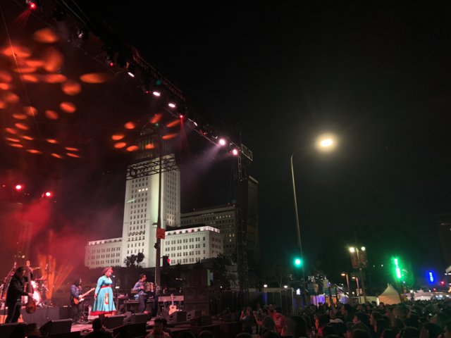 Electric Night: Rock Concert under the Urban Skyline