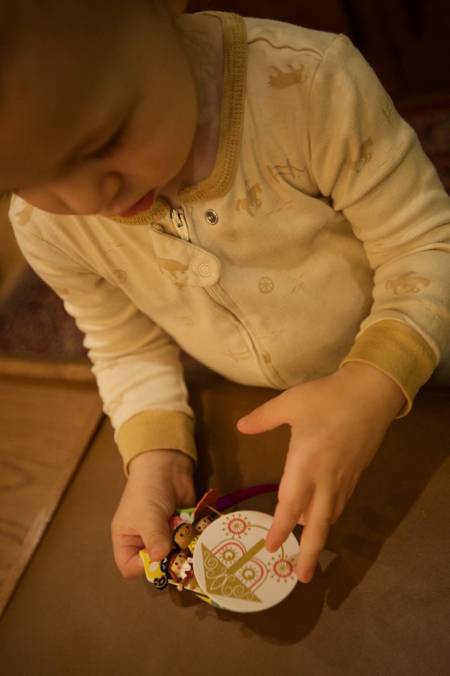 Toddler Decorating Christmas Ornament at Home