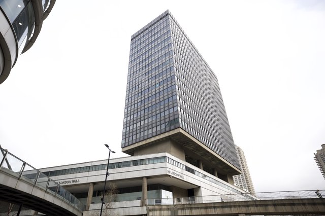 Brutalist Tower Rising Above London Wall Pedestrian Walkway