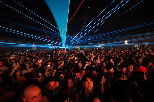 Laser Light Storm Over Massive EDM Festival Crowd