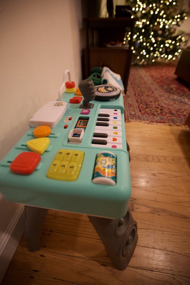 Children's Activity Table with Christmas Tree in Background
