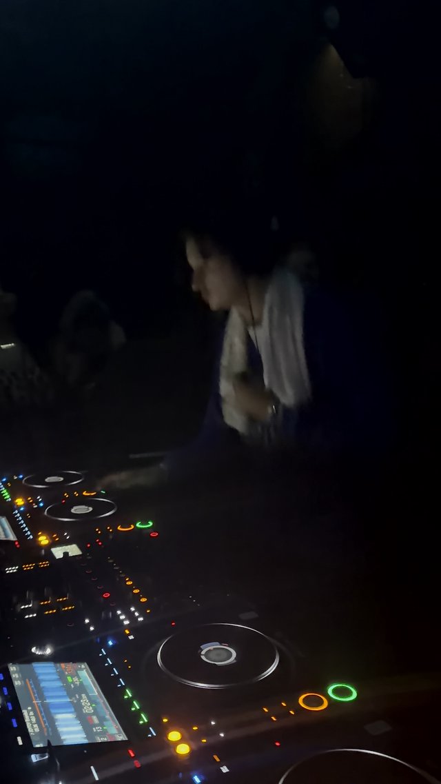 DJ Performance in Dark London Nightclub