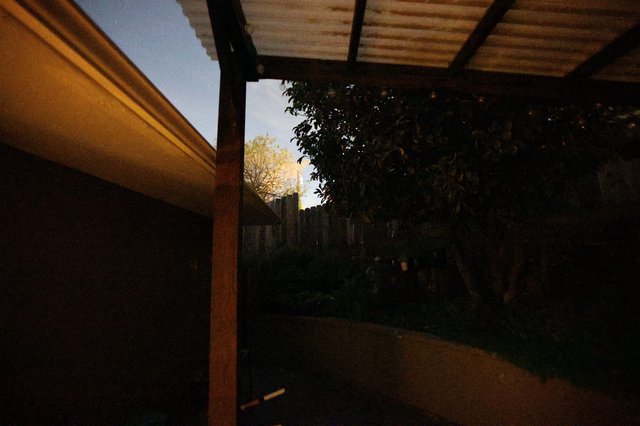 Evening View Through Covered Patio at Dusk