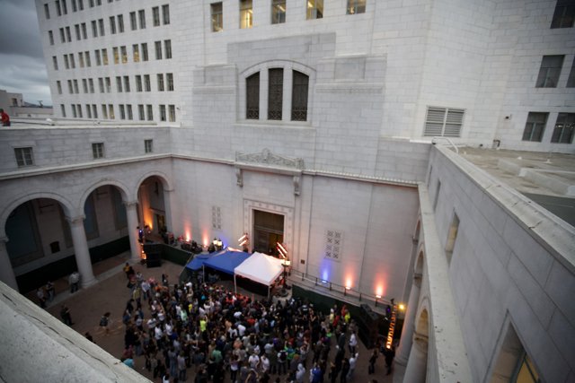 A Crowd Gathers at the Urban Office Building
