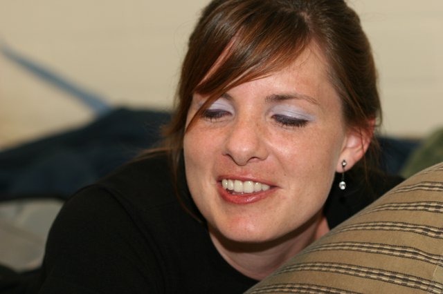Candid Portrait of a Smiling Young Woman Indoors