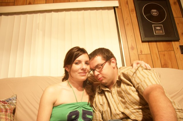 Couple Relaxing Together on Couch at Home