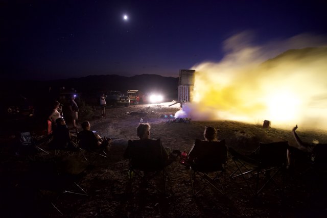 Night-time Rocket Launch Spectators
