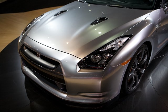 The Sleek Front-End of a Silver Nissan Sports Car