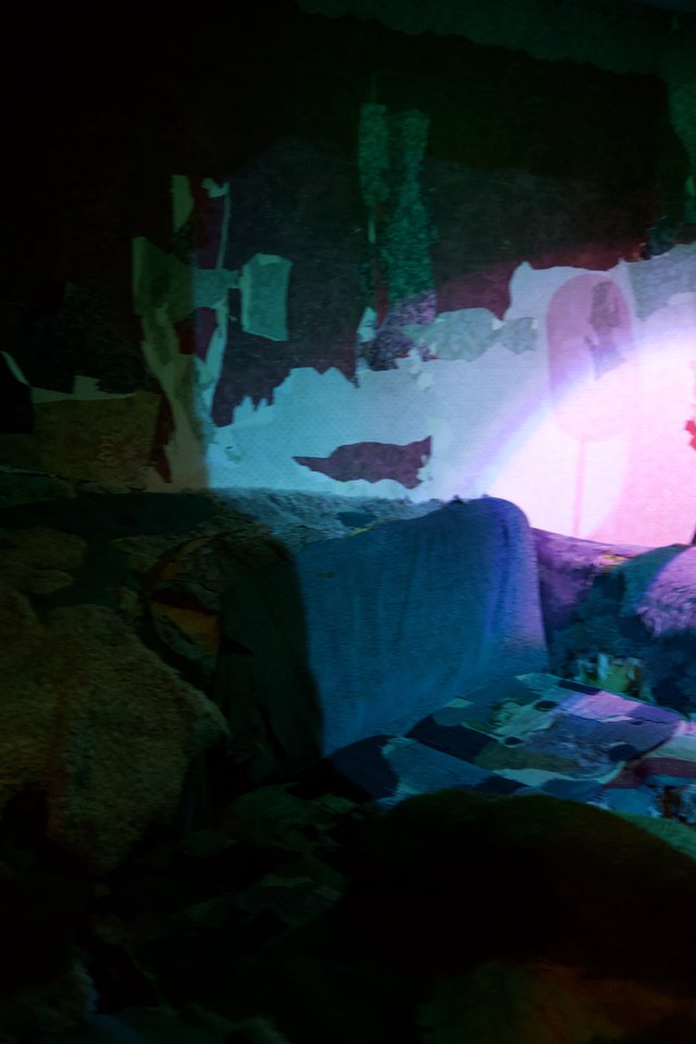 Illuminated Ice Formations in Underground Cave