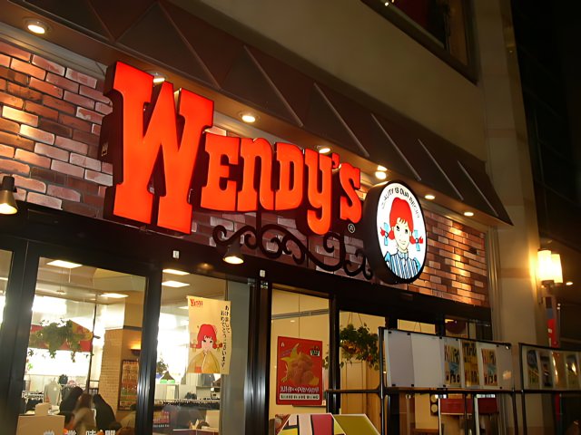Wendy's restaurant sign in urban setting