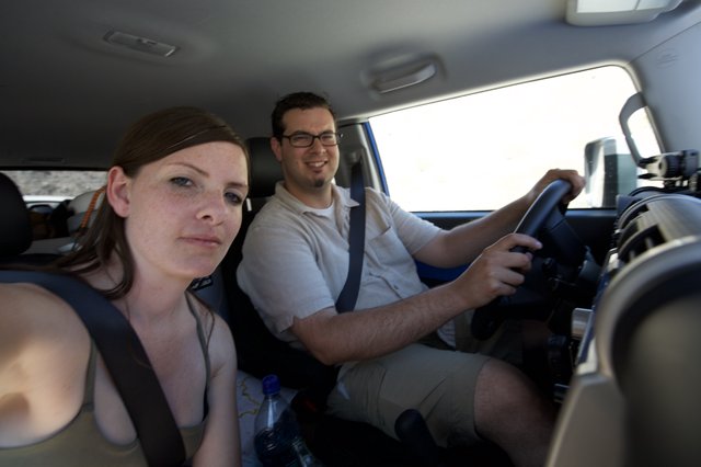 Desert Road Trip Couple Captures Selfie in SUV