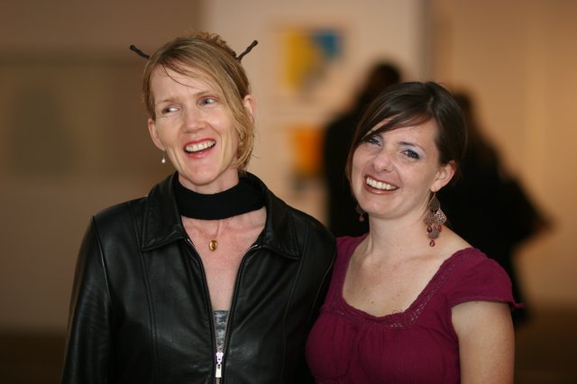 Two Women Laughing at March Art Walk 2006