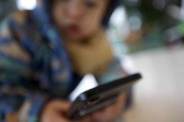 Mobile Phone Moment at Dinner Table