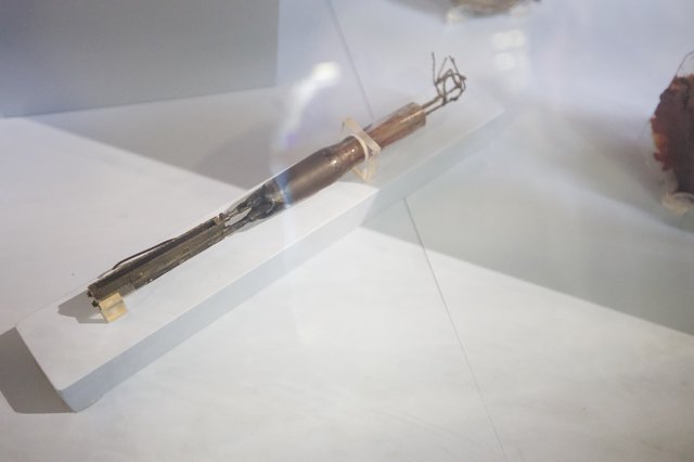 Ancient Bamboo and Metal Tool in Museum Display
