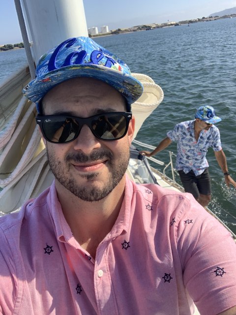 Hat and Shades on a Boat