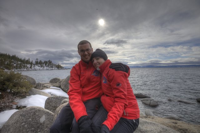 Couple Embracing at Winter Lake Tahoe Shoreline