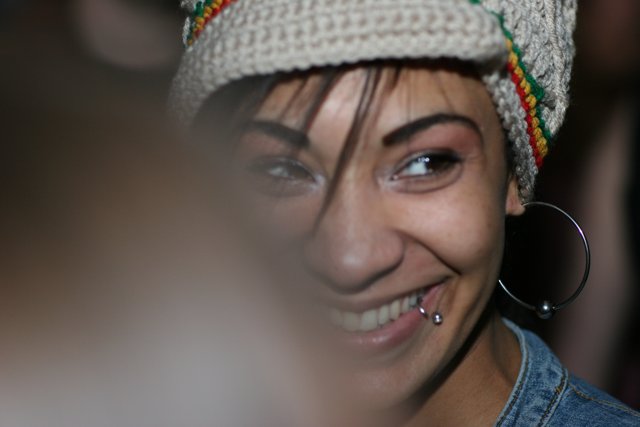 Smiling Woman in a Beanie Hat