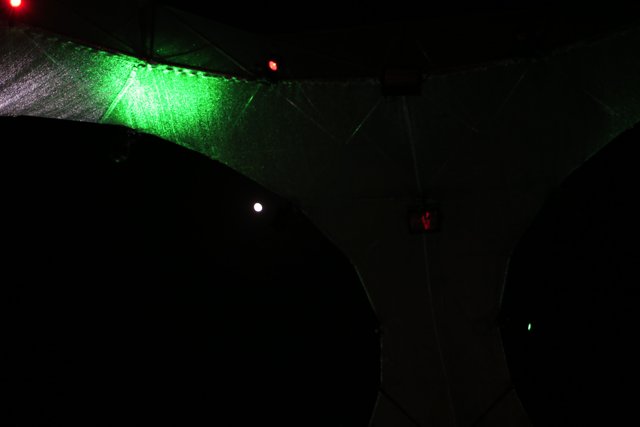 Green Laser Spotlight on a Tent at Coachella