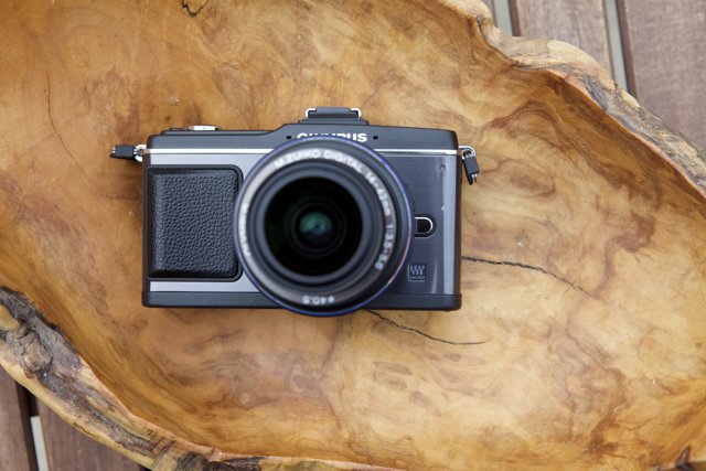 Snapshot of a Camera on a Wooden Surface