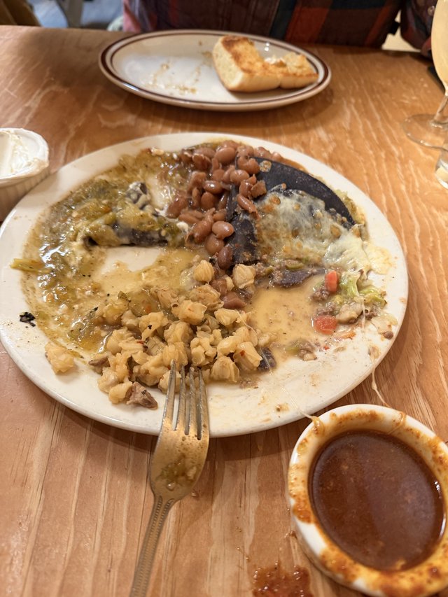 Well-Eaten New Mexican Combination Plate with Beans and Chile