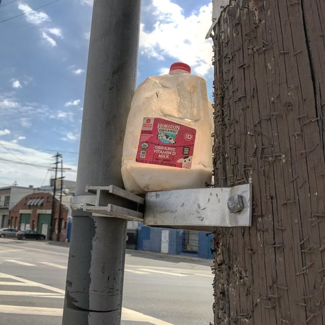 Milk on a Pole in the City