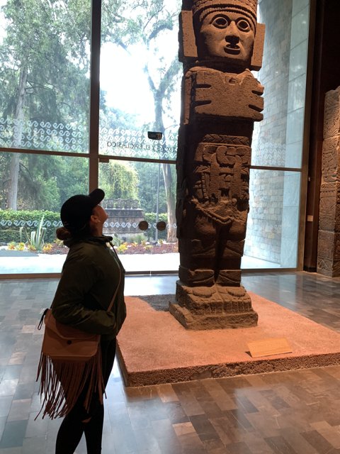 Standing with Symbolic Stone Statue