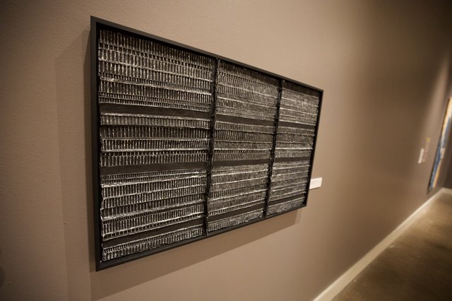 Framed Metallic Textile Art with Geometric Pattern Display