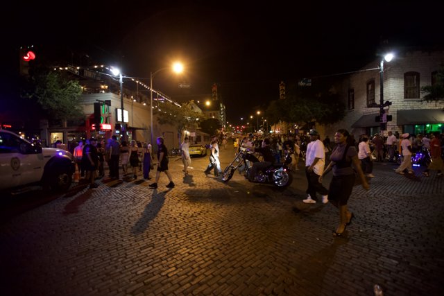 Nighttime Crowd on Austin's Cobblestone Streets