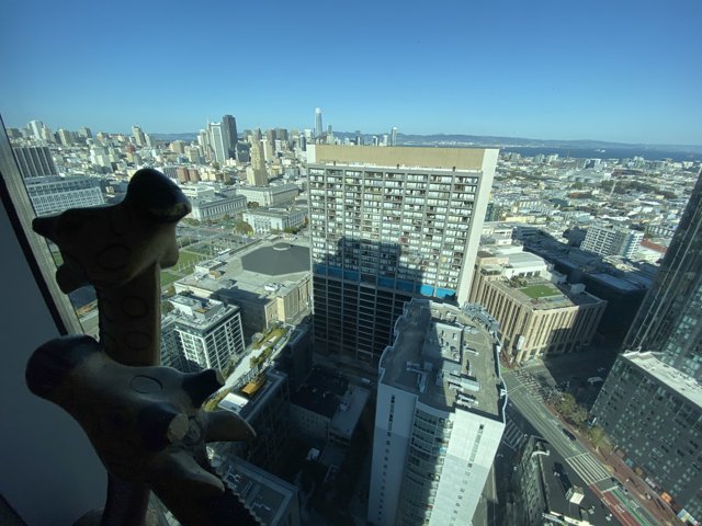 Giraffe Gazing Over the Metropolis
