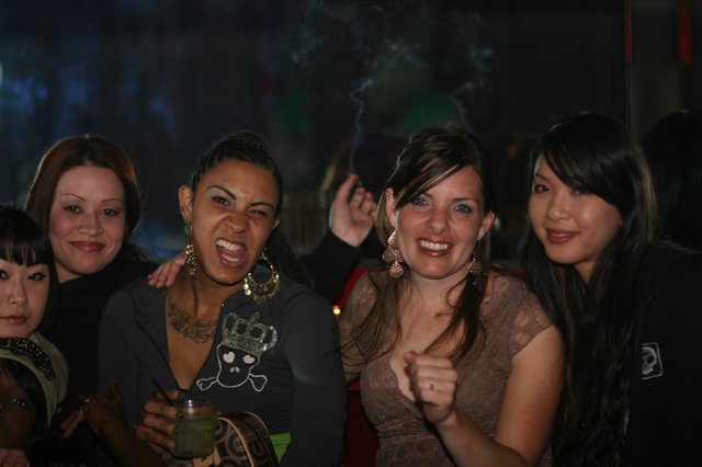 Friends Celebrating at a Nightclub in 2006