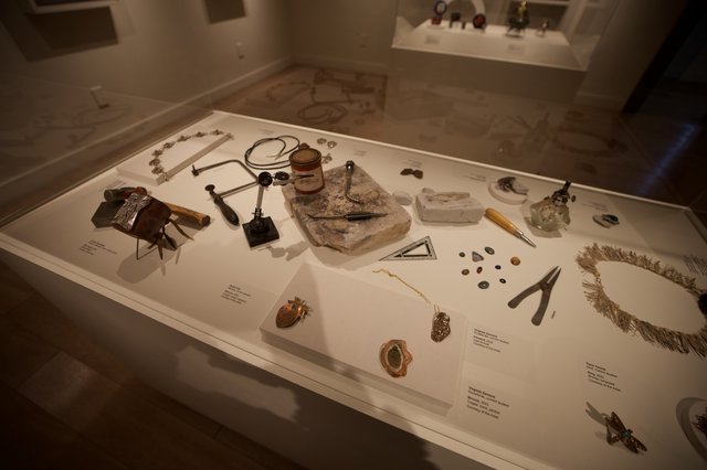 Museum Display Case of Personal Artifacts and Jewelry