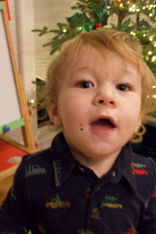 Curious Toddler on Christmas Morning