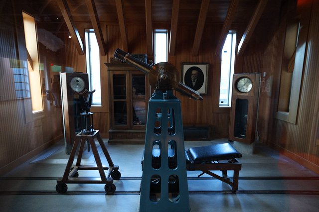 Historic Observatory Interior with Vintage Telescopes