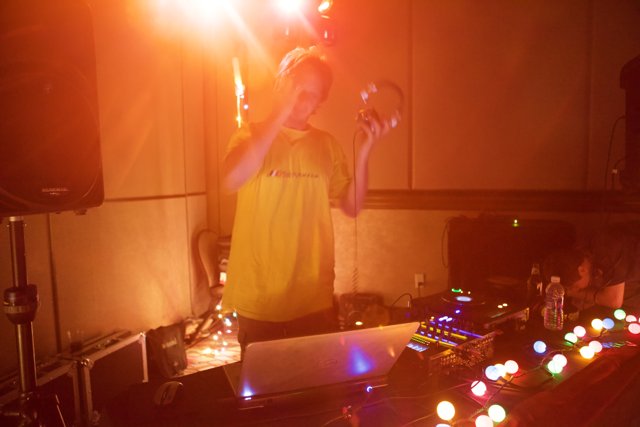 Yellow Shirted DJ Lights up Defcon Crowd
