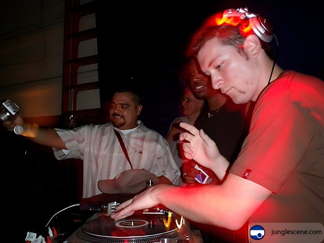 DJ David V Entertains Crowd at Night Club