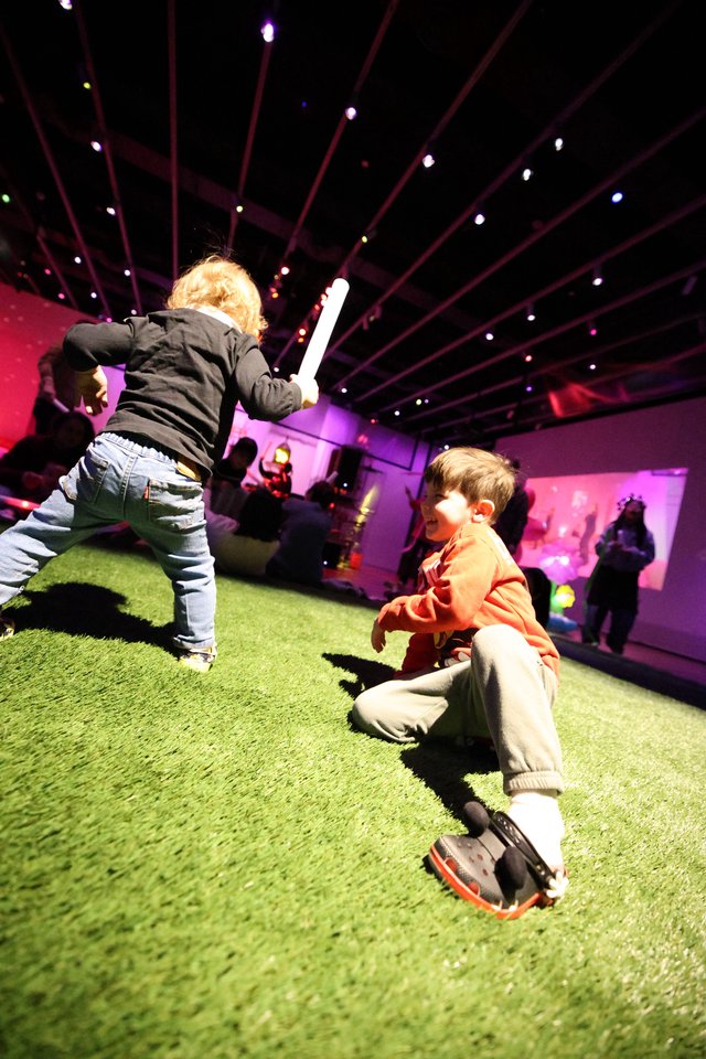 Children Playing at Baby Rave Light Installation