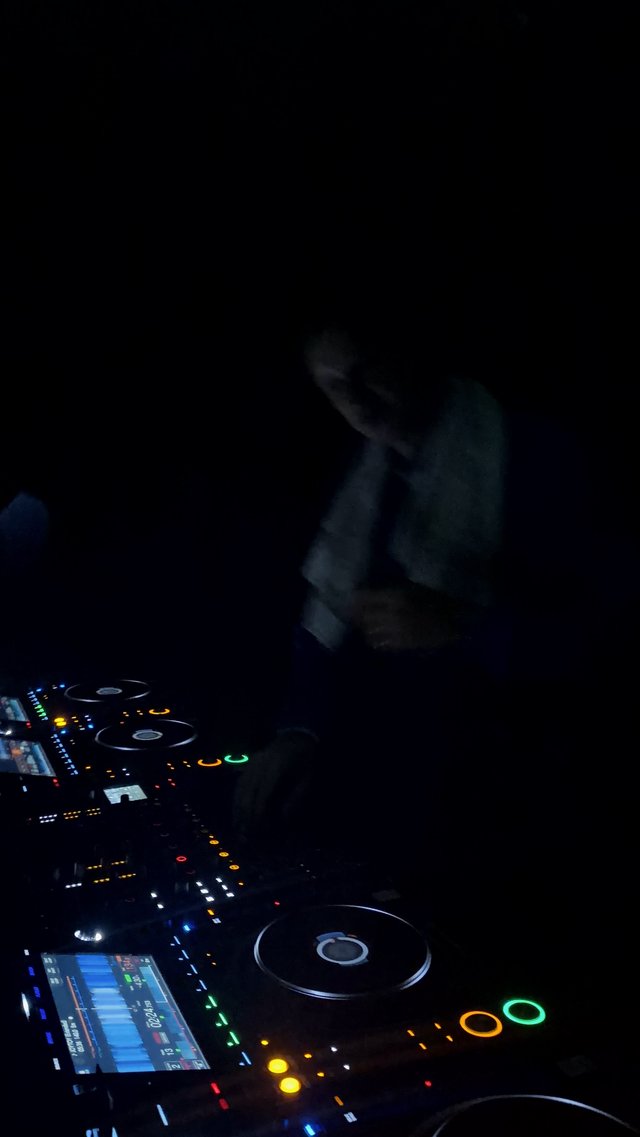 DJ Mixing Live at Night Club Performance