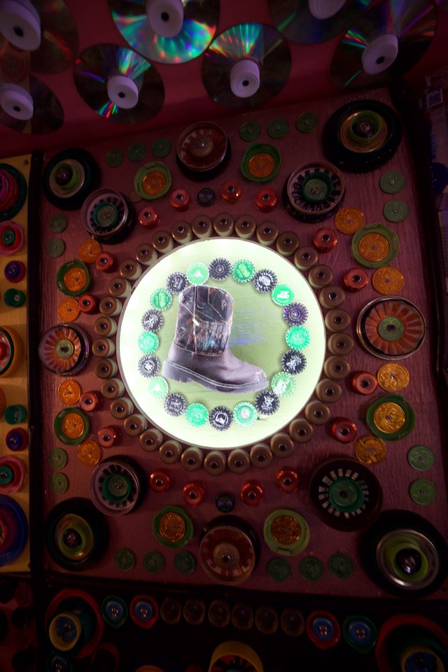 Folk Art Assemblage with Cowboy Boot and Bottle Caps