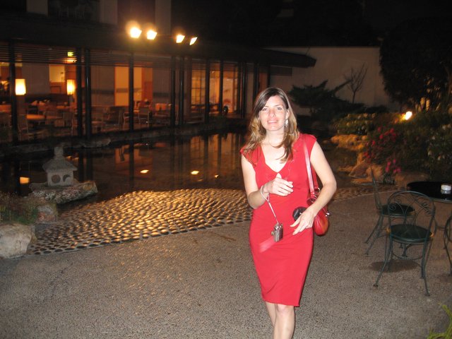 Elegant Woman in Red at New Otani Hotel Garden