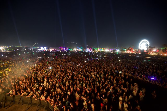 A Sea of People under the Night Sky at Coachella Music Festival
