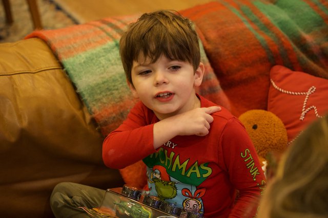 Young Boy in Grinch Pajamas on Christmas