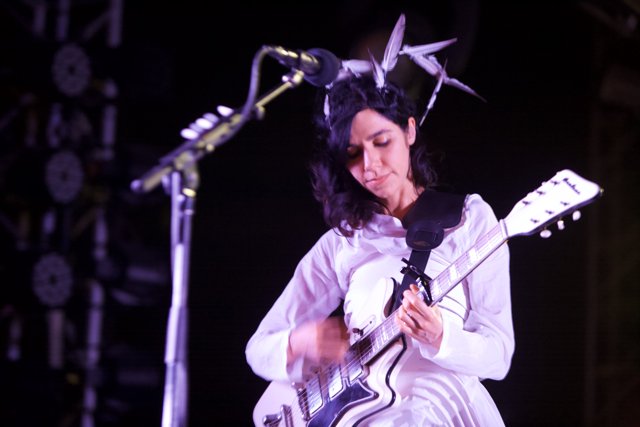 PJ Harvey Rocks the Stage with her Electric Guitar