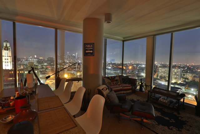 Penthouse Living Room with Stunning Cityscape View