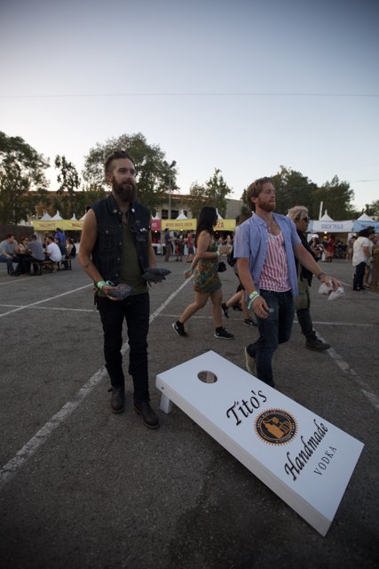 Cornhole Competition in the Parking Lot