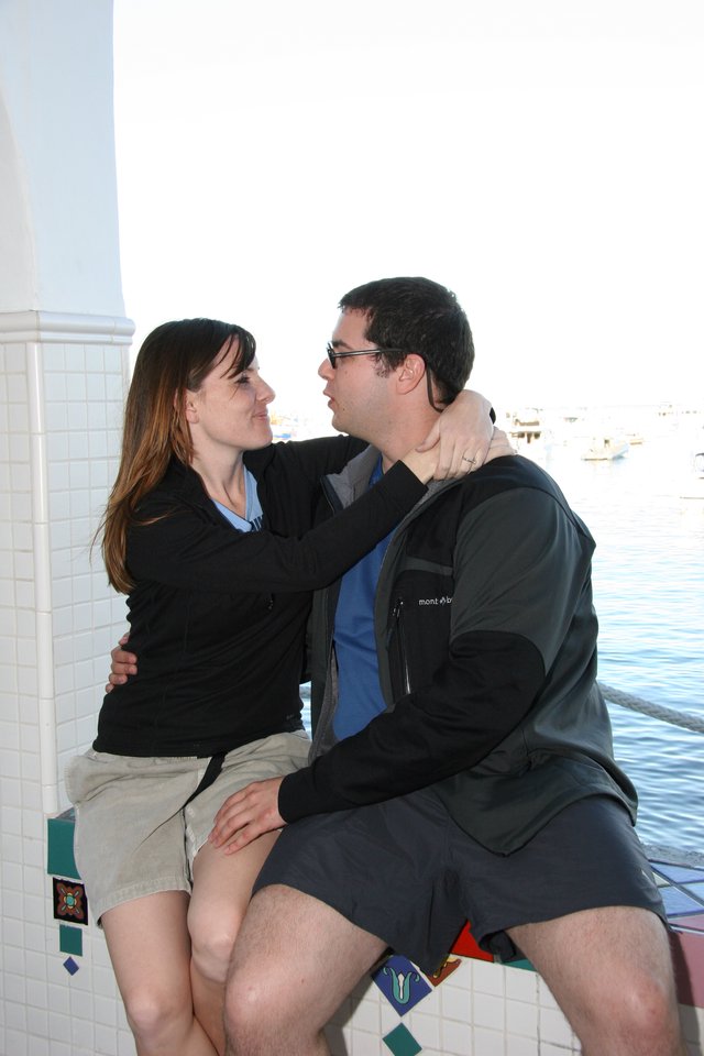 Romantic Couple Sharing a Tender Waterfront Moment