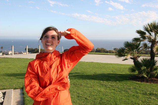 Smiling Woman Gazing Out at the Pacific Ocean