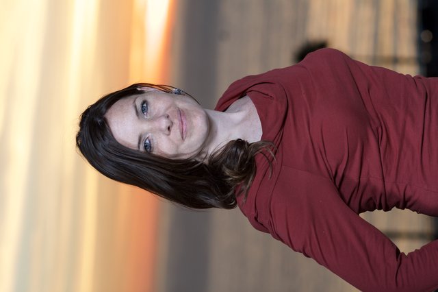 Woman in Red at Golden Hour Seaside